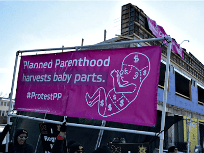 Planned-Parenthood-harvests-baby-parts-sign-Mandel-NganAFPGetty-Images-640x480.png